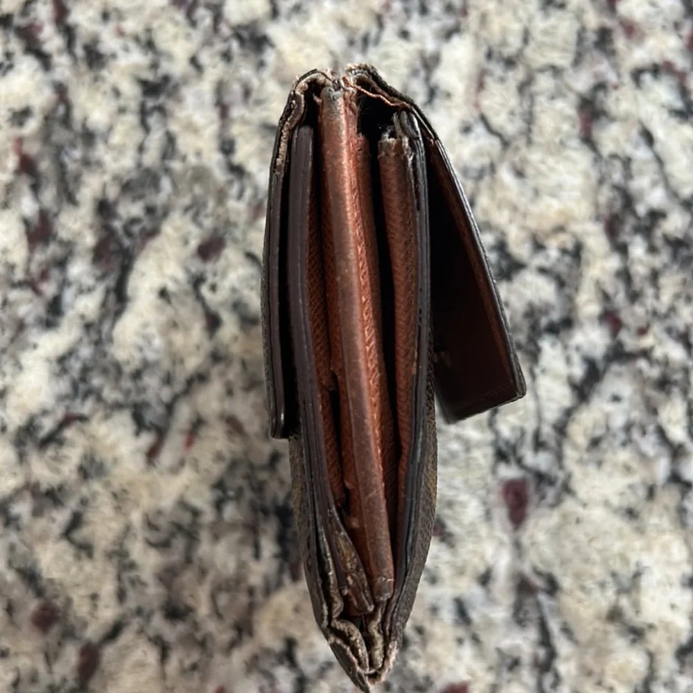 Louis Vuitton Dual Snap Wallet